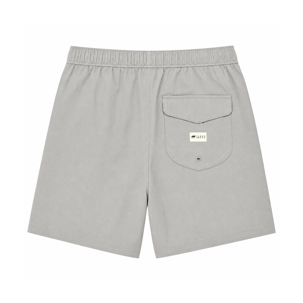 Gray shorts with a pocket and brand logo on a white background