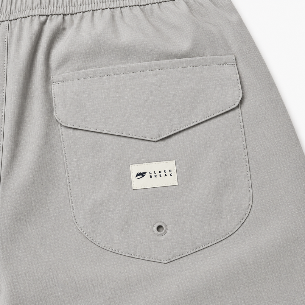 Gray shorts with a visible brand label on a white background