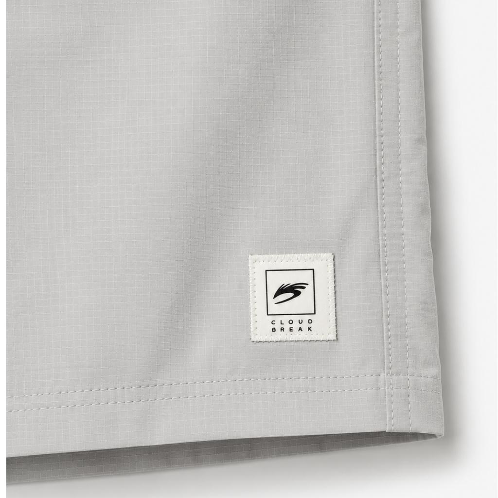 Gray shorts with a brand logo on a white background