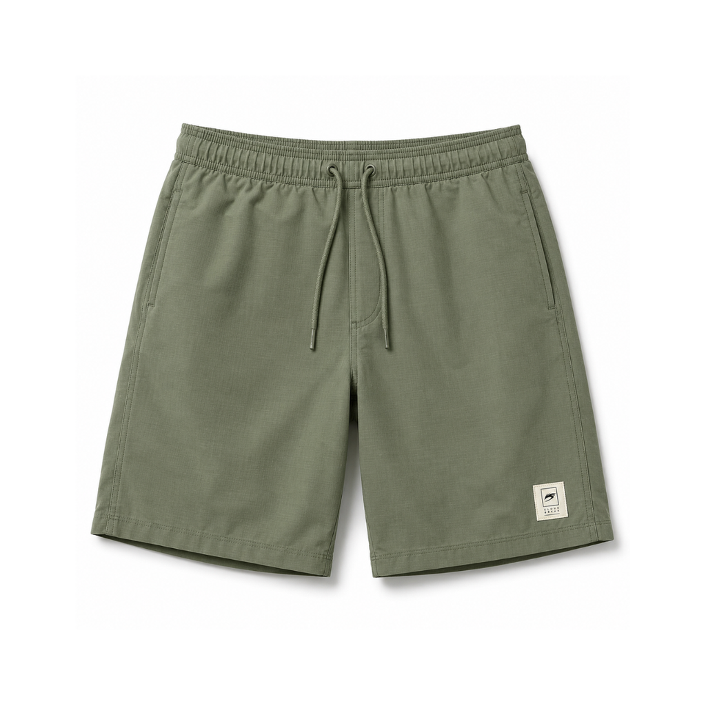 Green shorts with a drawstring on a white background
